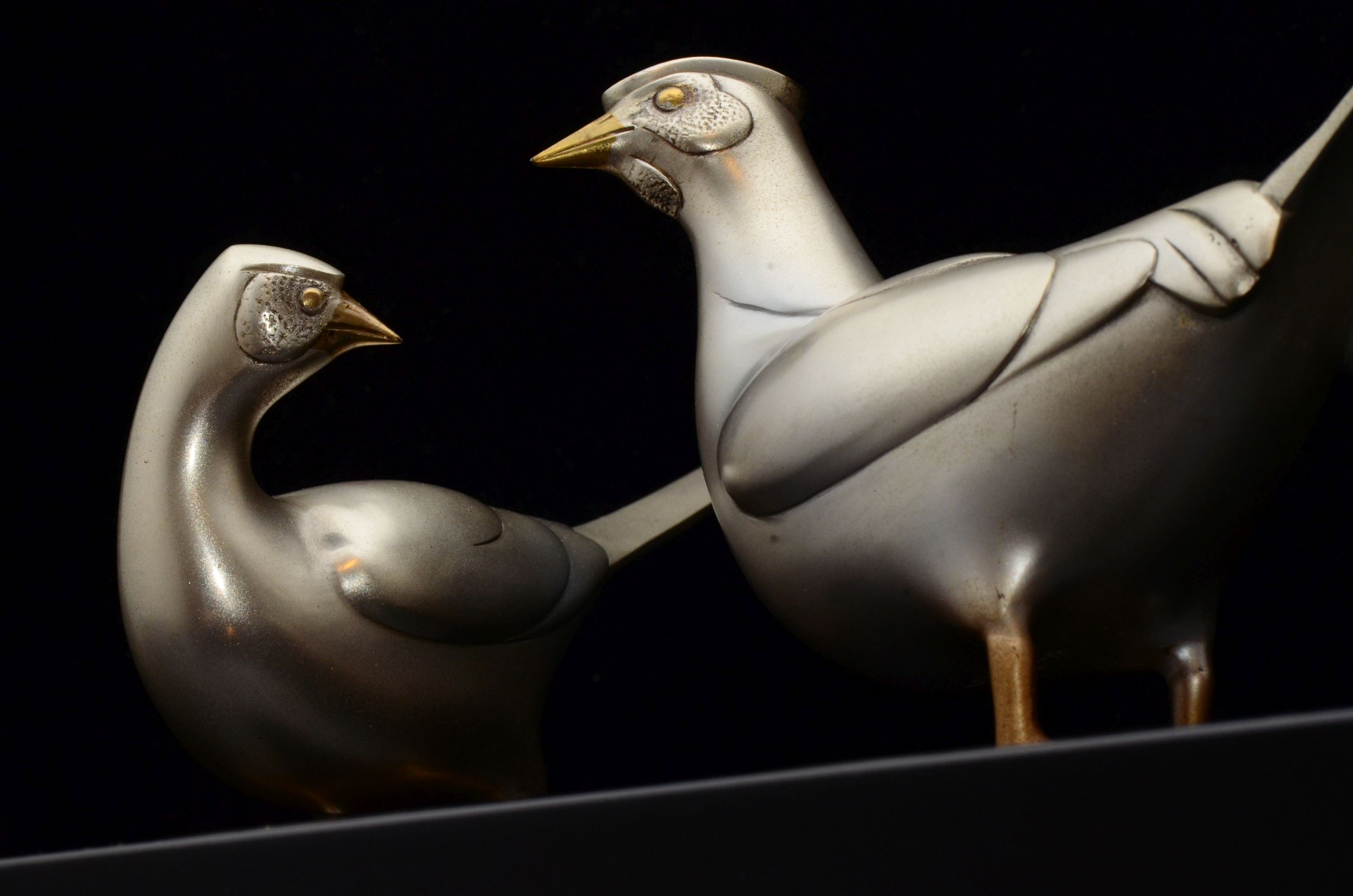 Two 20th century Japanese patinated bronze pheasants with lacquer stand, in original box